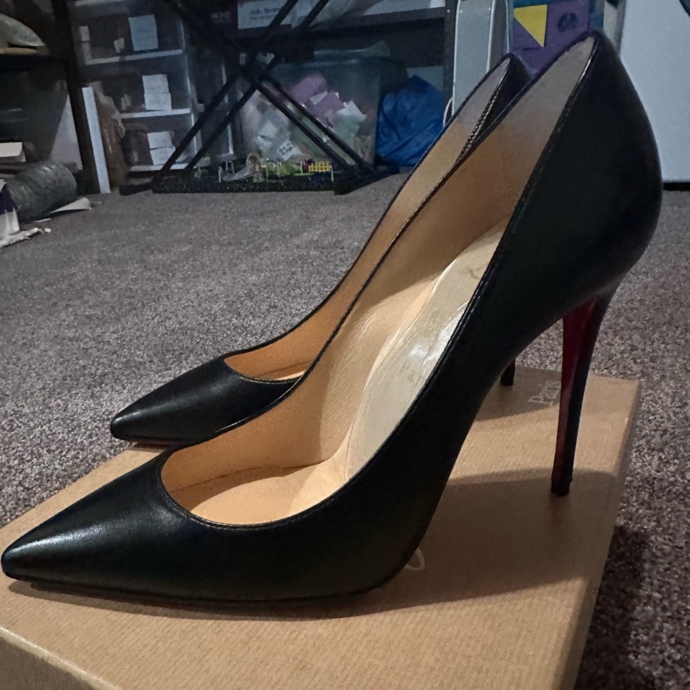 Classic black Christian Louboutin red bottom heels